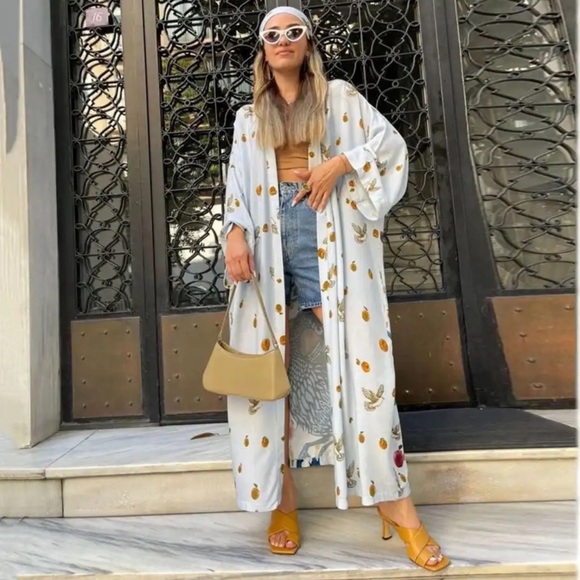 Blue Bird Fruit Blossoms
Kimono Duster
$74 $74 Size: Various - Picture 2 of 6